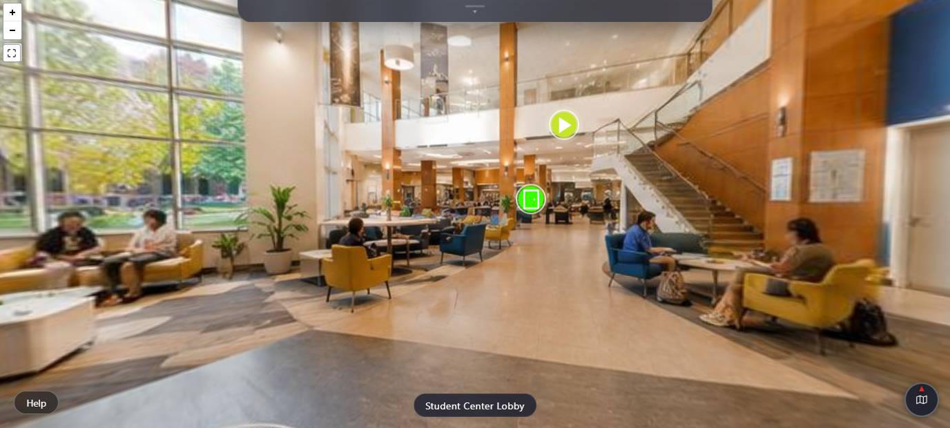 A 360° view of a campus student center lobby with tour markers